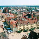 Wrocław (Breslau), Ostseite des Rathauses mit astronomischer Uhr. Copyright : Polnisches Fremdenverkehrsamt