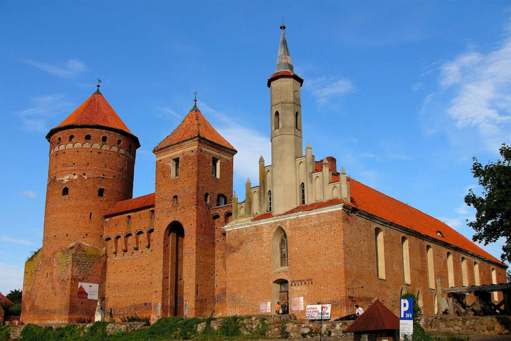 Zu sehen ist die Ordensburg mit Kirche in Rössel, Bild: Gliwi